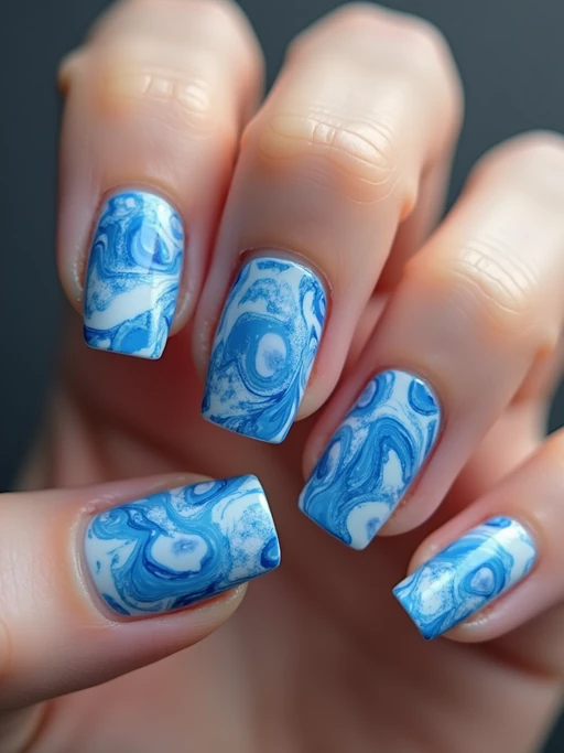 marble effect nails in blue and white, luxury nail spa vibe, macro shot, detailed swirling texture, artistic styling