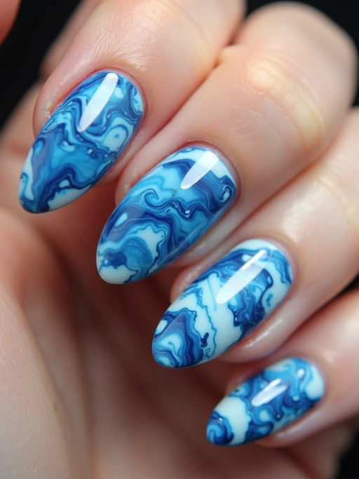 marble effect nails in blue and white, luxury nail spa vibe, macro shot, detailed swirling texture, artistic styling