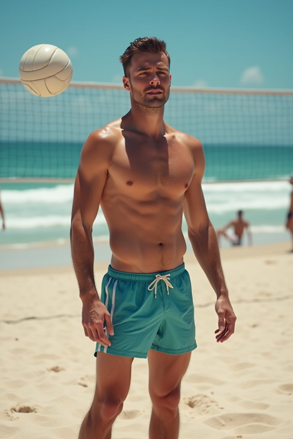 man in  swim trunks on a beach volleyball court, ready to serve