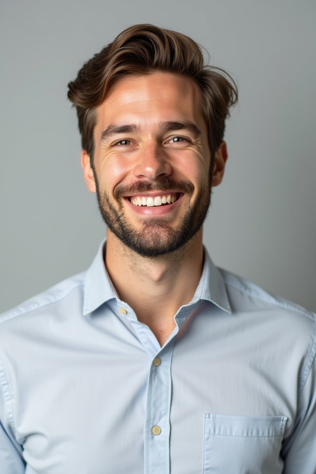 A professional therapist headshot of a compassionate man, taken in a well-lit studio with a plain backdrop. The man is dressed in  a neat, light-colored shirt with a friendly expression. The lighting is soft and even, highlighting their facial features with a warm and approachable expression. The focus is sharp, capturing the man's eyes and reassuring smile, creating a perfect headshot for therapy practices and professional profiles.