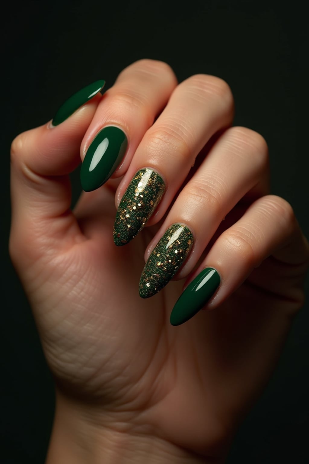 deep green nails with gold foil flakes, rich luxurious styling, elegant hand posture, dramatic lighting setup