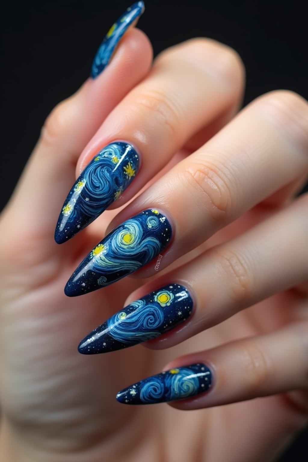 nails with starry night sky design inspired by Van Gogh, swirling blue and yellow patterns, clean softbox lighting, posed fingers with high gloss