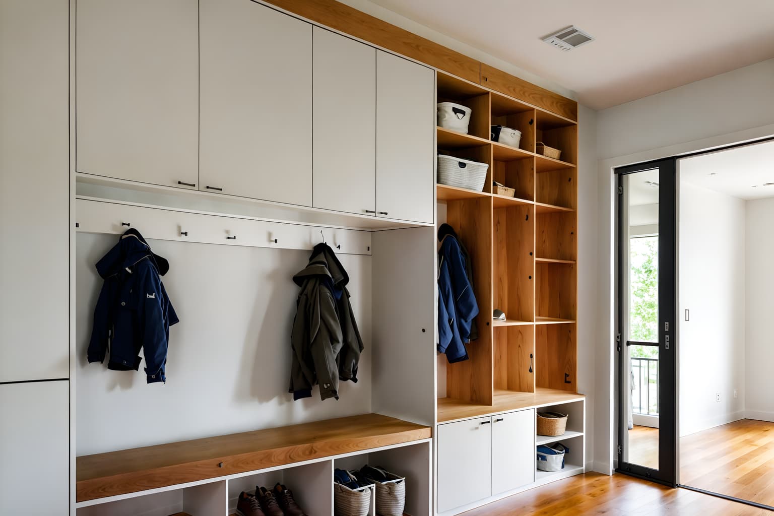 minimalist-style (mudroom interior) with storage drawers and high up storage and cubbies and storage baskets and cabinets and wall hooks for coats and shelves for shoes and a bench. . with focus on the shape, colour and texture of just a few of essential elements and functional furniture and an open floor plan and clean lines and a monochromatic palette with colour used as an accent and lots of light and focus on the shape, colour and texture of just a few of essential elements. . cinematic photo, highly detailed, cinematic lighting, ultra-detailed, ultrarealistic, photorealism, 8k. minimalist interior design style. masterpiece, cinematic light, ultrarealistic+, photorealistic+, 8k, raw photo, realistic, sharp focus on eyes, (symmetrical eyes), (intact eyes), hyperrealistic, highest quality, best quality, , highly detailed, masterpiece, best quality, extremely detailed 8k wallpaper, masterpiece, best quality, ultra-detailed, best shadow, detailed background, detailed face, detailed eyes, high contrast, best illumination, detailed face, dulux, caustic, dynamic angle, detailed glow. dramatic lighting. highly detailed, insanely detailed hair, symmetrical, intricate details, professionally retouched, 8k high definition. strong bokeh. award winning photo.