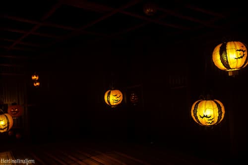 photo from pinterest of halloween-style interior designed (onsen interior) . with cobwebs and yellow black balloons and lanterns and glowing pumpkins and cobwebs and lanterns and skeletons sitting and standing and spiderwebs. . cinematic photo, highly detailed, cinematic lighting, ultra-detailed, ultrarealistic, photorealism, 8k. trending on pinterest. halloween interior design style. masterpiece, cinematic light, ultrarealistic+, photorealistic+, 8k, raw photo, realistic, sharp focus on eyes, (symmetrical eyes), (intact eyes), hyperrealistic, highest quality, best quality, , highly detailed, masterpiece, best quality, extremely detailed 8k wallpaper, masterpiece, best quality, ultra-detailed, best shadow, detailed background, detailed face, detailed eyes, high contrast, best illumination, detailed face, dulux, caustic, dynamic angle, detailed glow. dramatic lighting. highly detailed, insanely detailed hair, symmetrical, intricate details, professionally retouched, 8k high definition. strong bokeh. award winning photo.