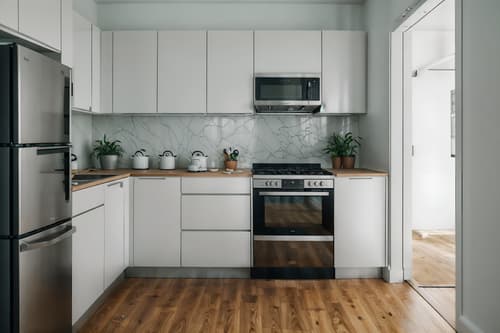 photo from pinterest of simple-style interior designed (kitchen interior) with stove and sink and kitchen cabinets and worktops and plant and refrigerator and stove. . . cinematic photo, highly detailed, cinematic lighting, ultra-detailed, ultrarealistic, photorealism, 8k. trending on pinterest. simple interior design style. masterpiece, cinematic light, ultrarealistic+, photorealistic+, 8k, raw photo, realistic, sharp focus on eyes, (symmetrical eyes), (intact eyes), hyperrealistic, highest quality, best quality, , highly detailed, masterpiece, best quality, extremely detailed 8k wallpaper, masterpiece, best quality, ultra-detailed, best shadow, detailed background, detailed face, detailed eyes, high contrast, best illumination, detailed face, dulux, caustic, dynamic angle, detailed glow. dramatic lighting. highly detailed, insanely detailed hair, symmetrical, intricate details, professionally retouched, 8k high definition. strong bokeh. award winning photo.